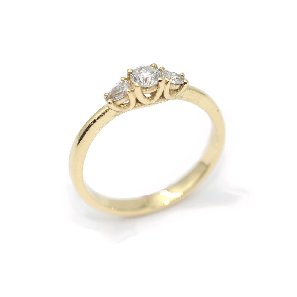gold ring drop and round diamonds