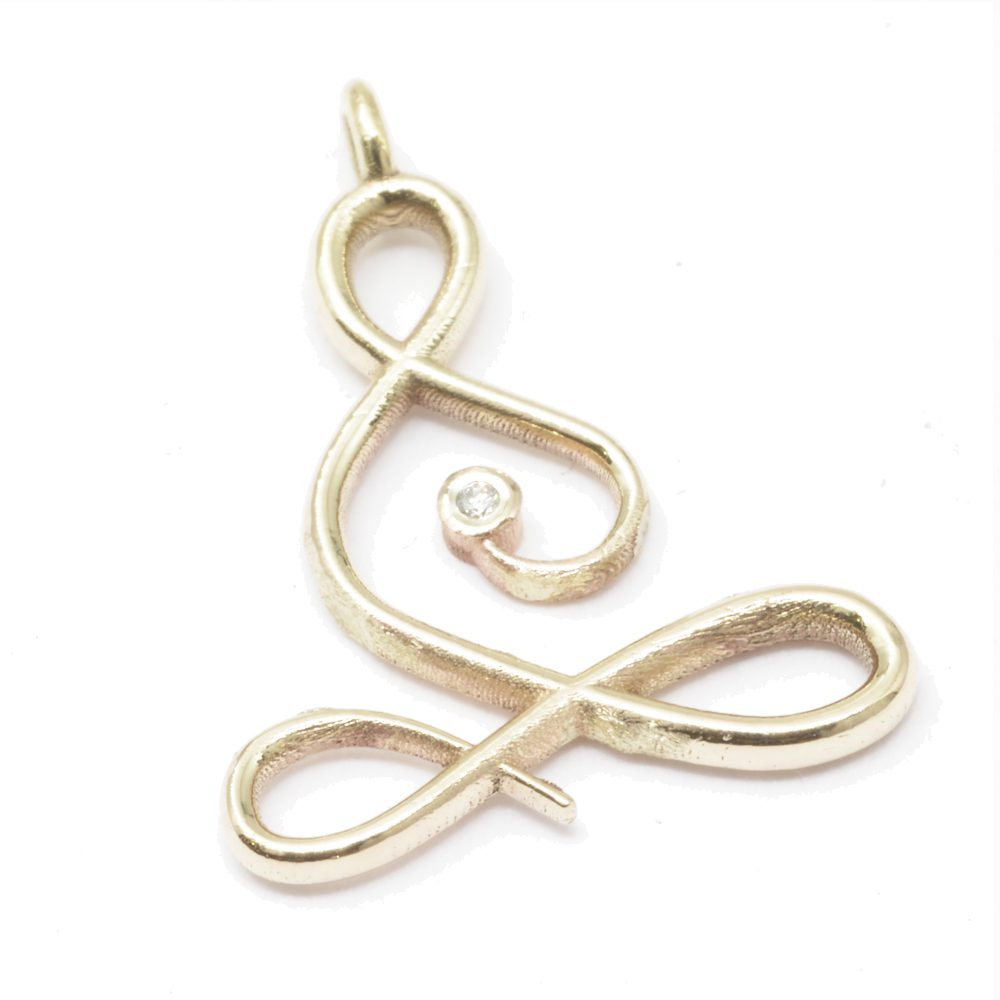 yoga shape gold diamond pendant